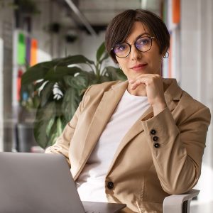 medium-shot-woman-working-with-laptop